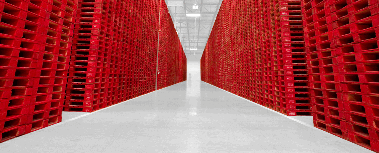 Pallets Lining a Corridor